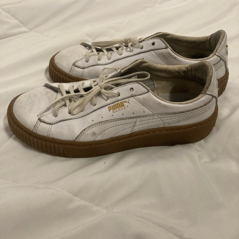 White heeled puma shoes
